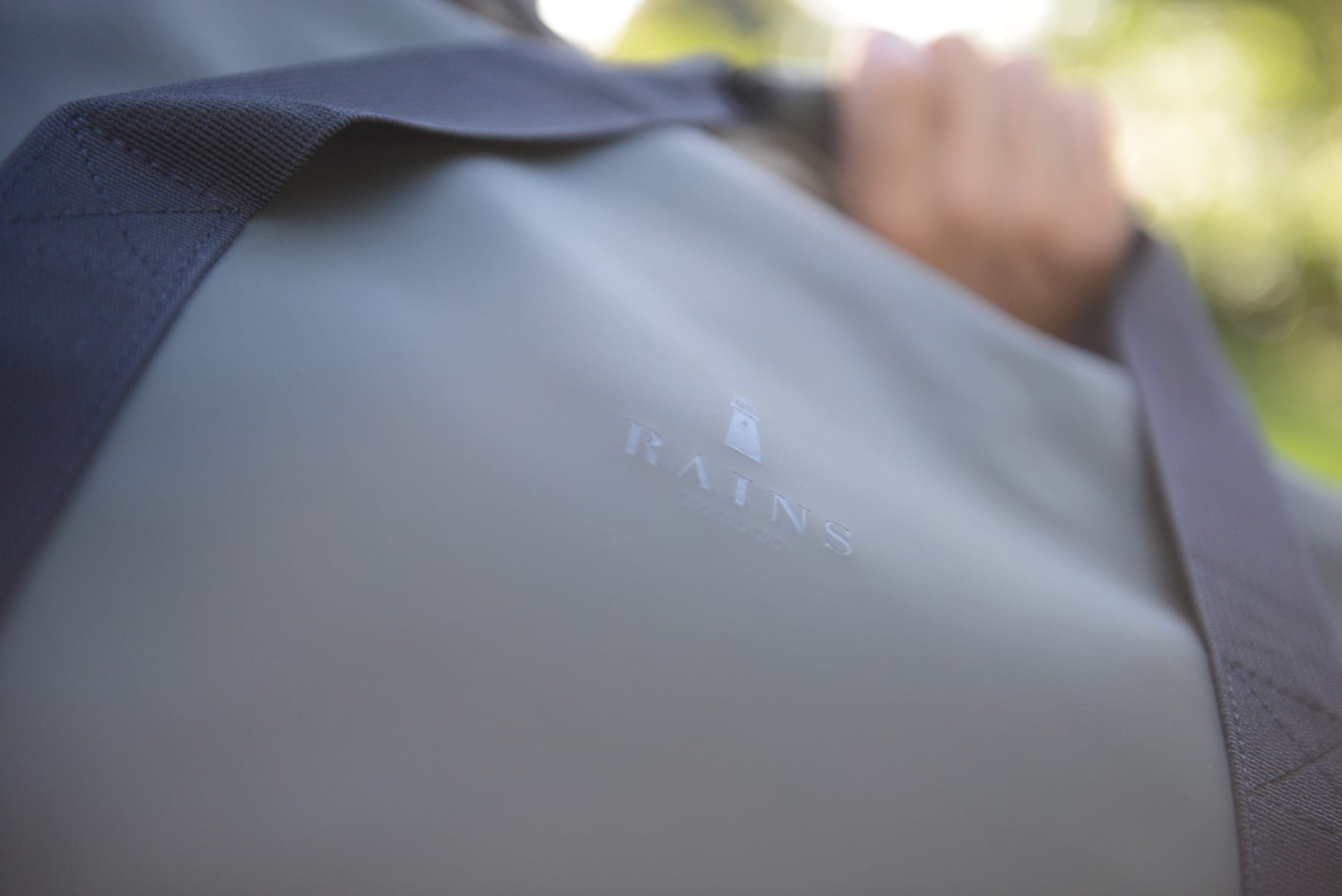 The Rains features a thick, waterproof fabric