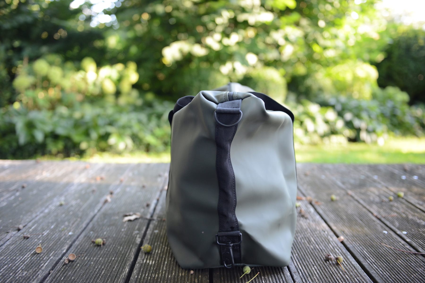 Rains Weekend bag on wooden porch