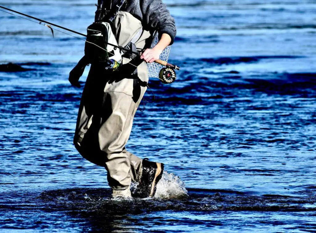 Fly Fisherman with Waders and Wading Boots 