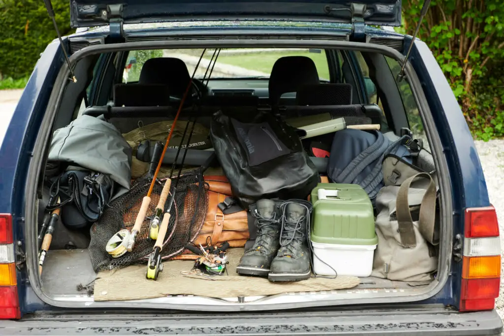 Fly fishing gear in the trunk of a car