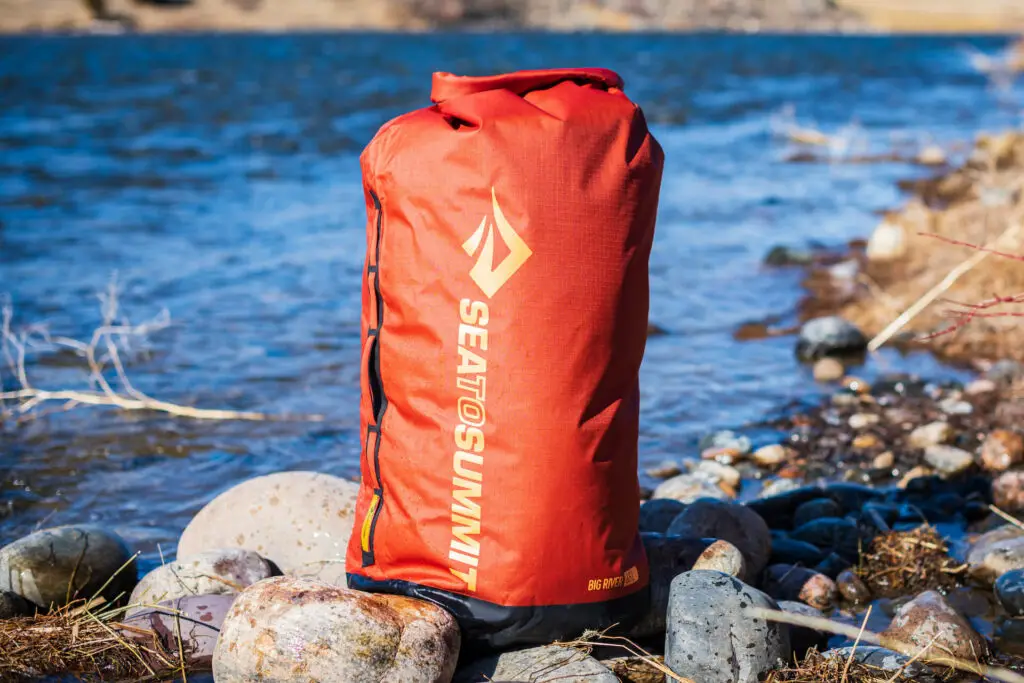 Sea to Summit Big River Dry Bag 65L on the river bank