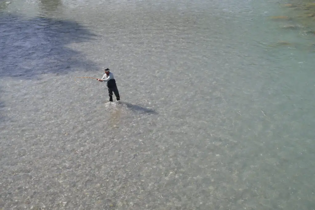 Fly fisherman in water on the Bregenzer Ache