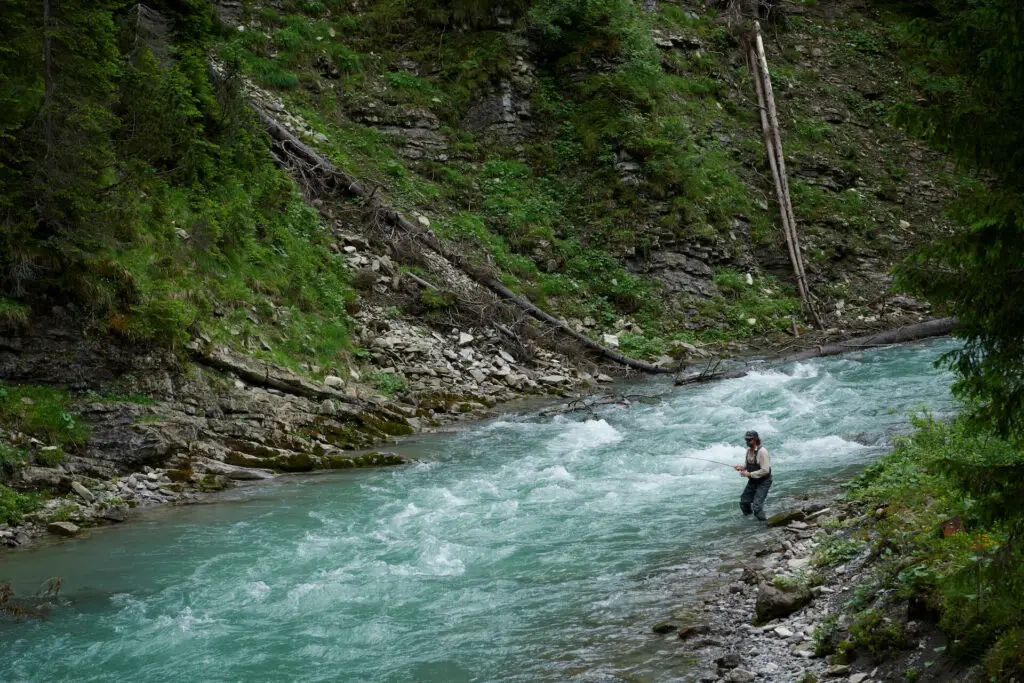 Fly fisherman in water at the River Lech