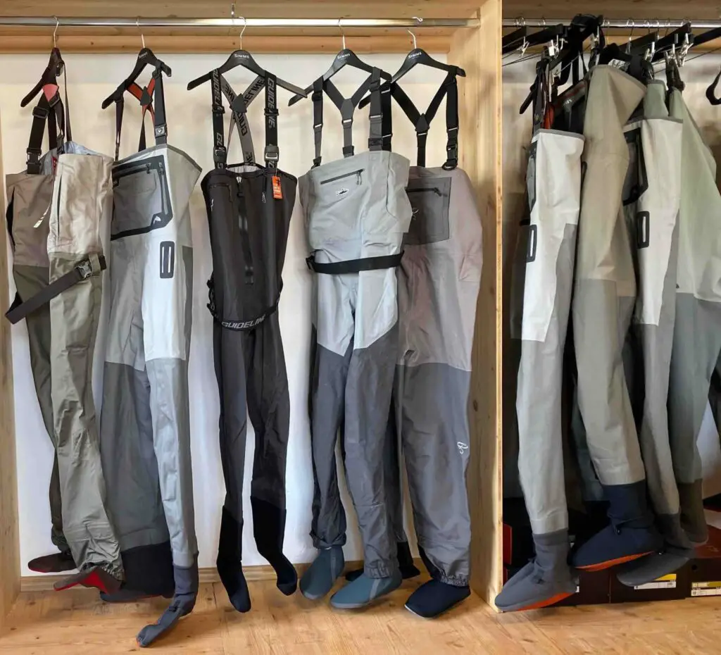 Fly fishing waders on hangers