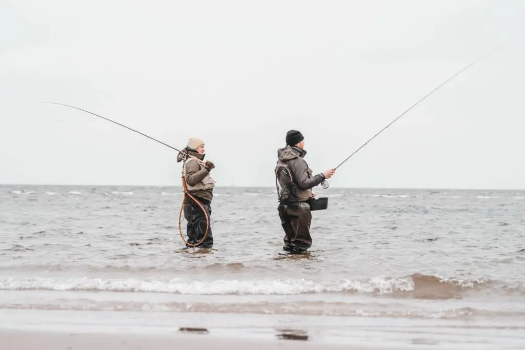 Fishermen with neoprene waders standing in the water