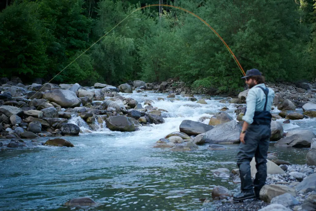 Fly fisherman on the river: Review of the best trout fly rods 2021