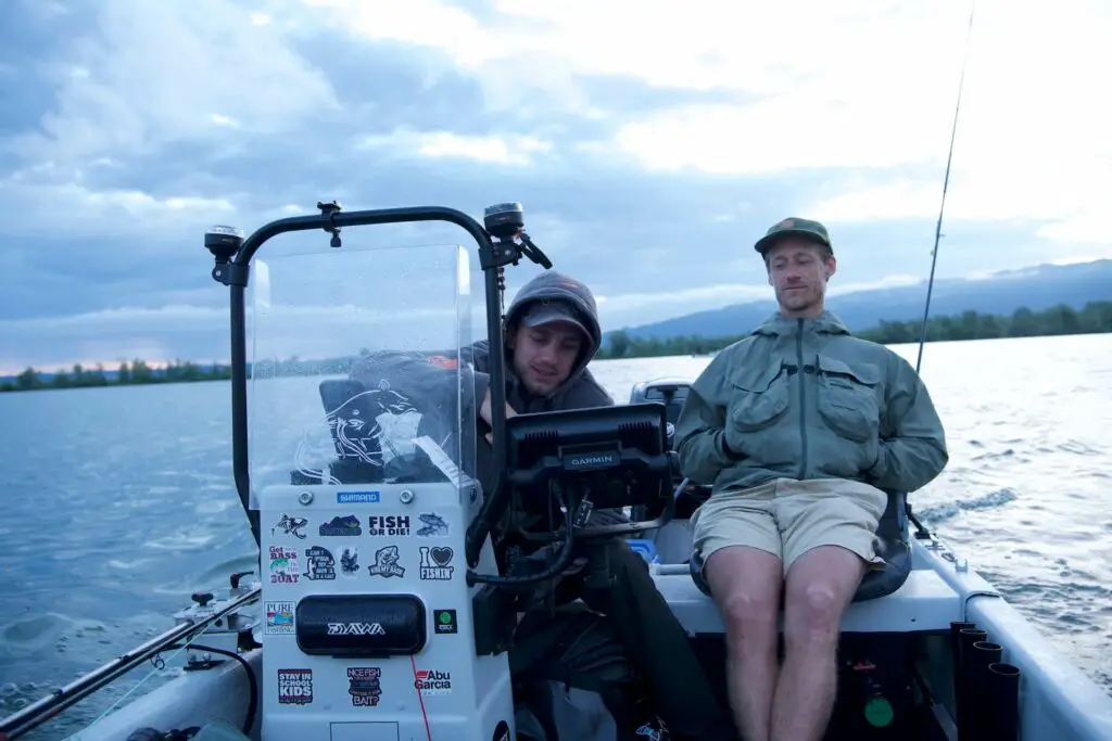 two fishermen looking at a fish finder: Best Fish Finder for the Money Review