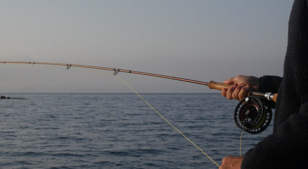 Casting a saltwater fly rod in the sea