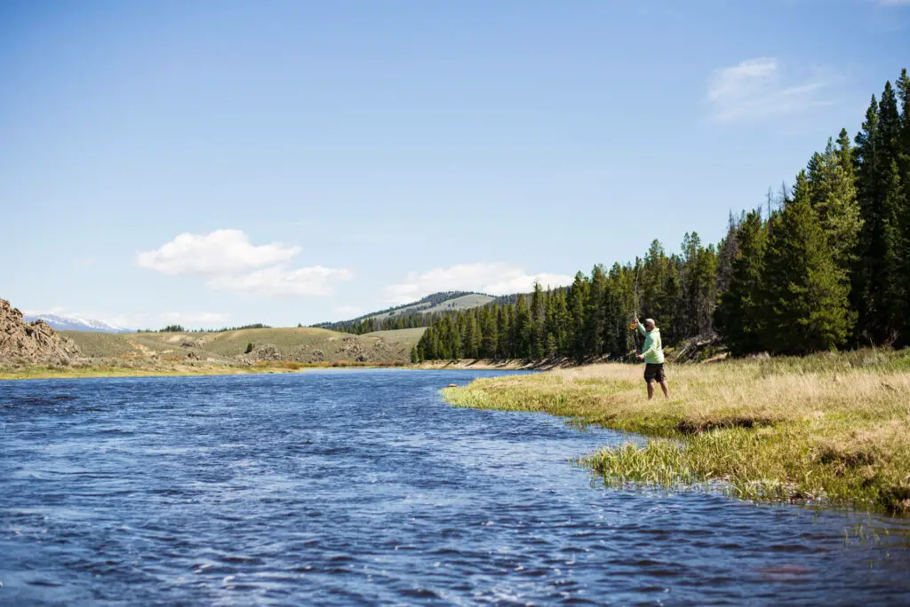 Wade fishing on the banks of the upper Big Hole River