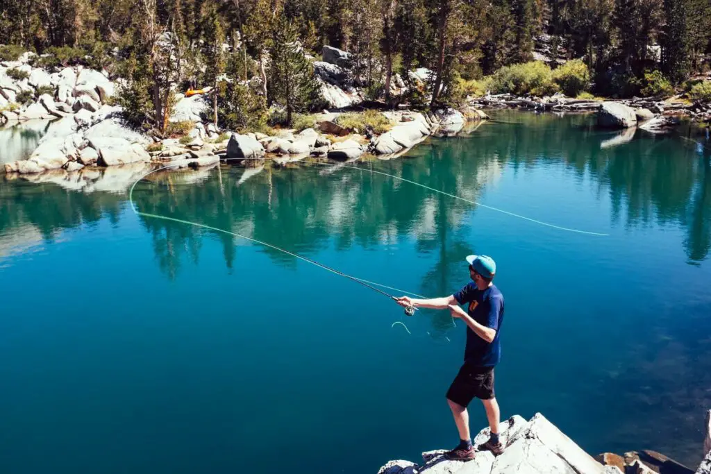 Fly fishing wearing wet wading shoes