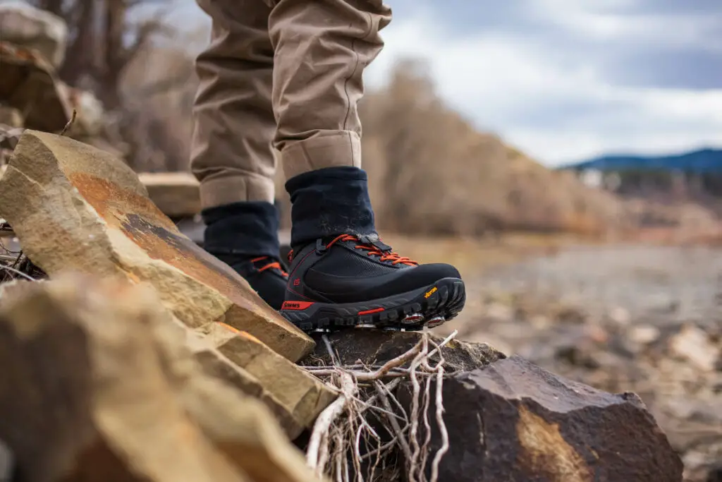 Simms G4 Pro Powerlock Wading Boots on rocks