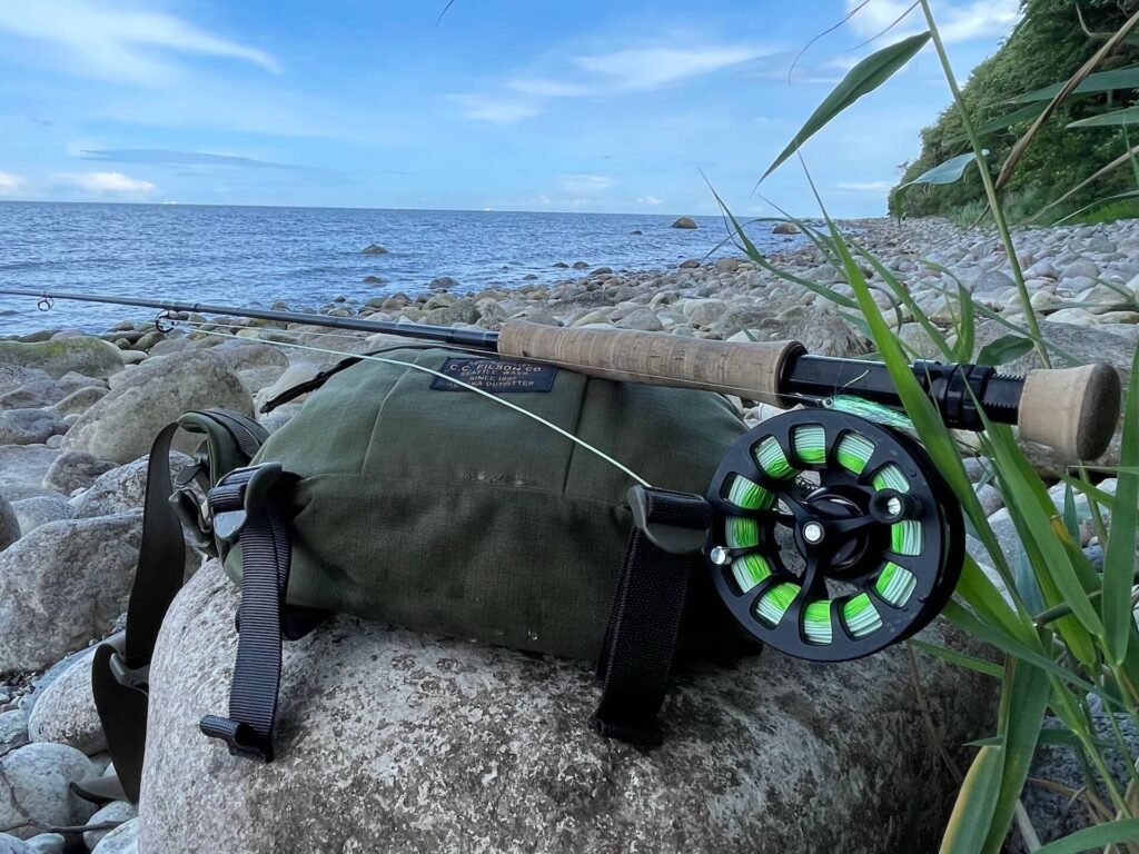Fly rod and reel at the shore