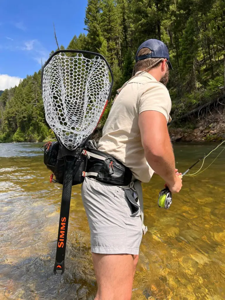 Wade fishing the Gallatin river with the Simms Daymaker Landing net