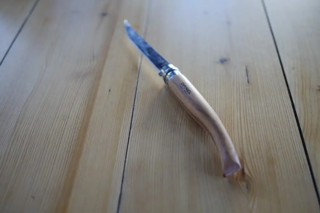 Opinel Slim Line No 12 Knife on a table