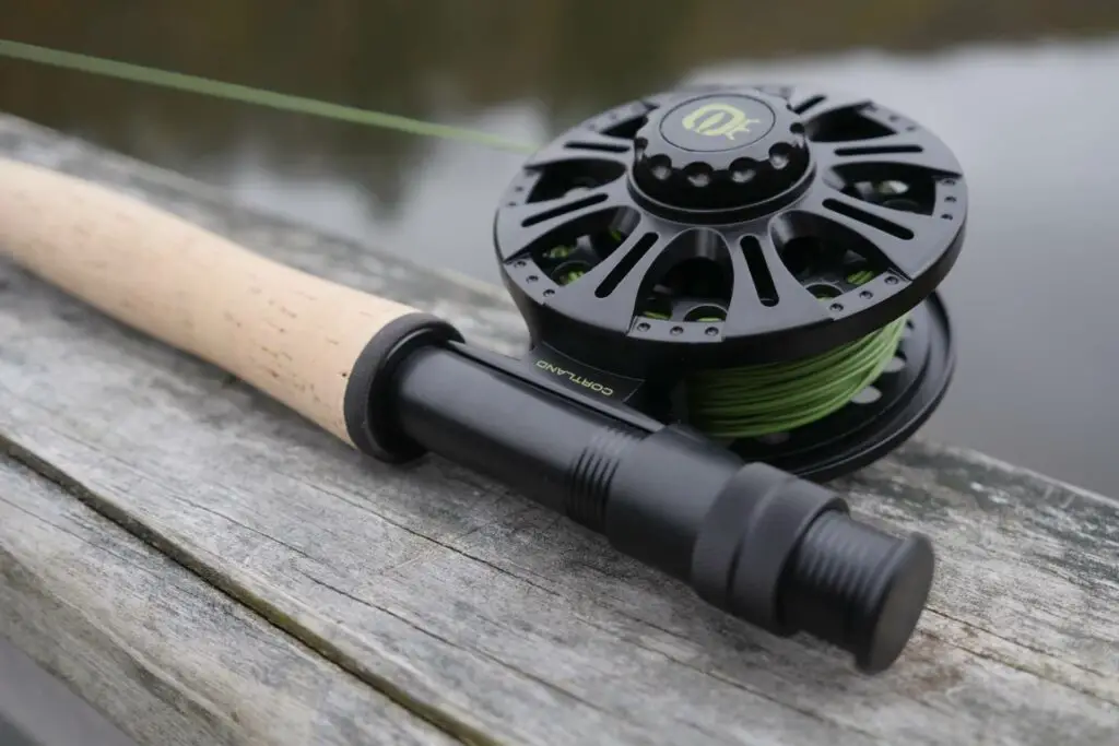 The Cortland Guide Series Combo Outfit features a deep black blank and reel design