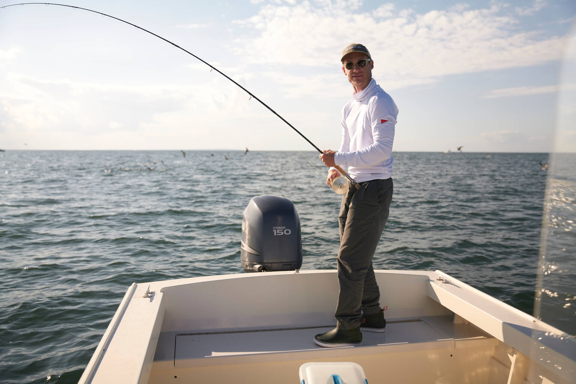 Saltwater fishing with the Florence X Sun Pro Long Sleeve Hooded UPF Shirt