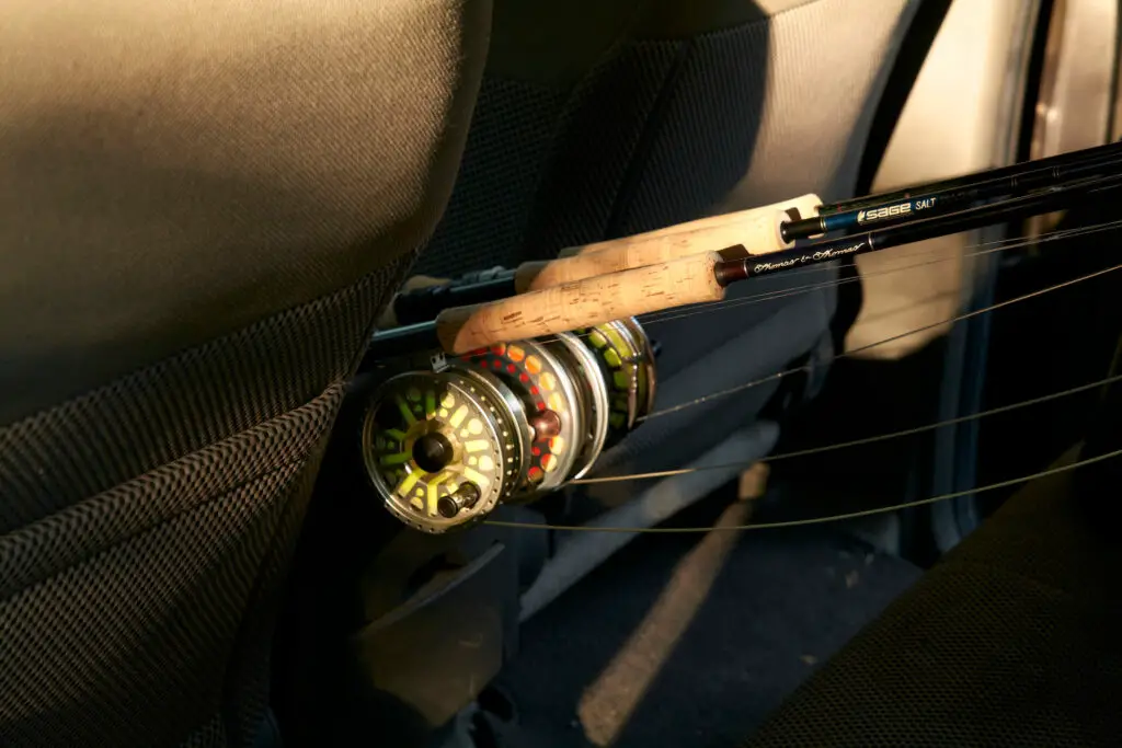 Fly Rod Weights explained: different fly rods and reels in the backseat of a car