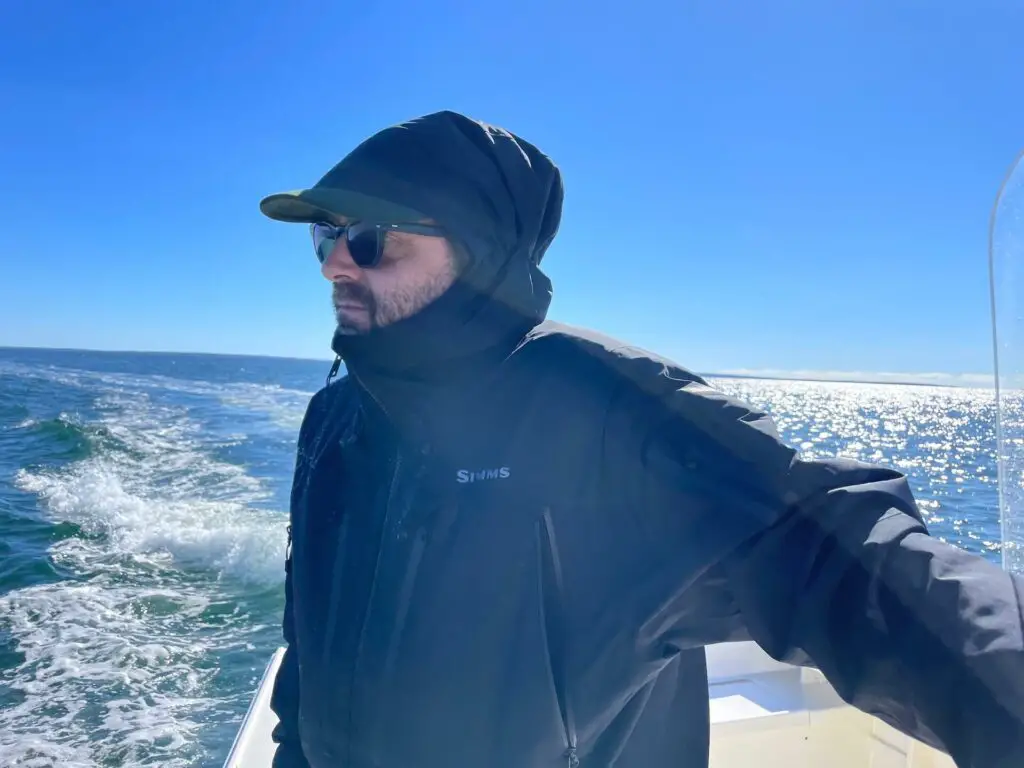 Simms Bulkley Wading Jacket while fishing for stripers in Montauk, NY.