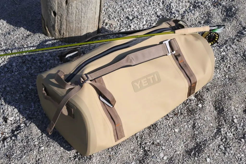 YETI Panga 75 Duffel on lake shore