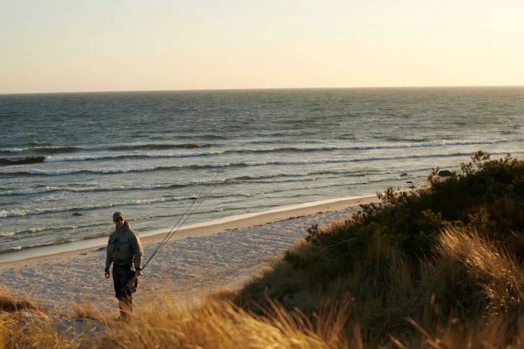 Fly fisherman on the beach