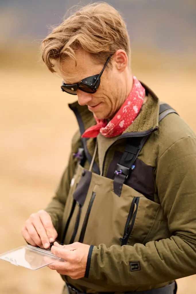 Fly fisherman wearing the new Patagonia Expedition Zip Front waders.