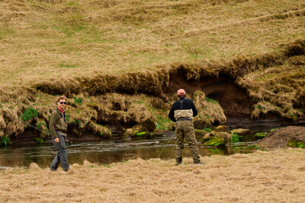 Fly fishermen fishing a river