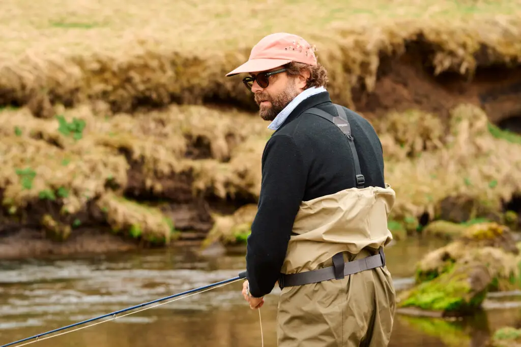 Fly fisherman wearing the new Patagonia Traverse Zip front waders