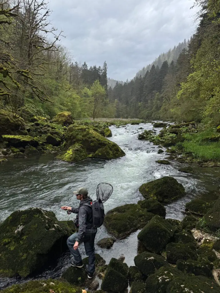 Fly fisherman with backpack