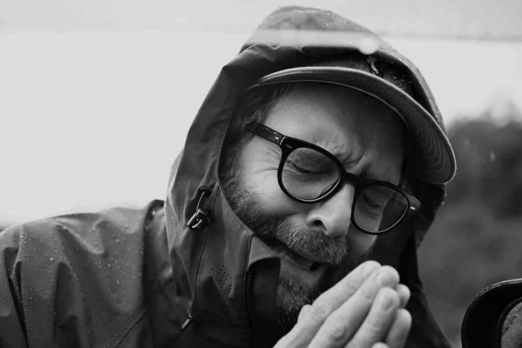 Fly fisherman praying