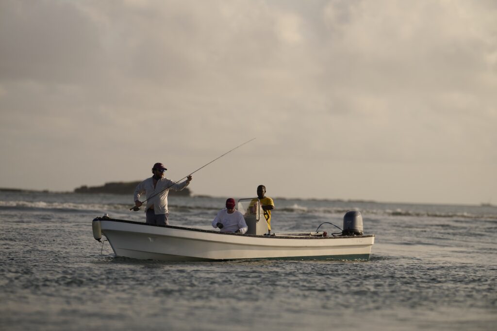 Getting ready to cast off a boat while salt water fishing at Manda Bay, Kenya. 
