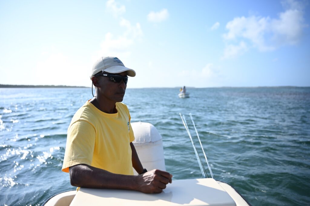 Fly fishing guide in boat