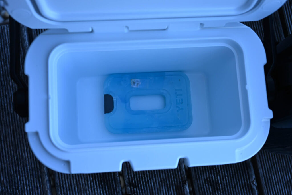 YETI Roadie 8 packed with an ice sheet inside the cooler