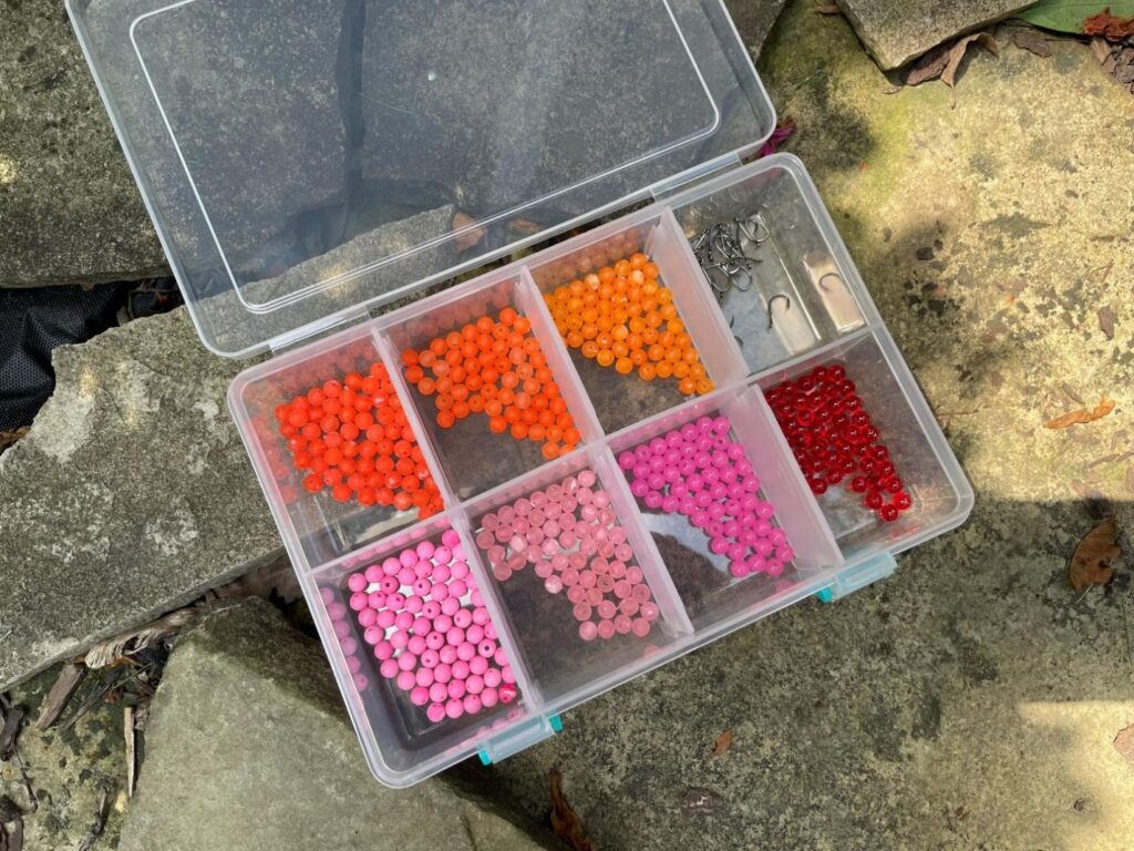 Orange and pink plastic bead eggs used for Yellowstone cutthroat trout
