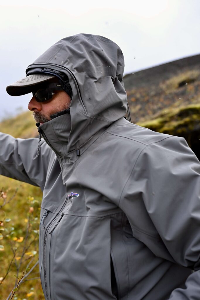 Fly fishermen in Patagonia jacket casting
